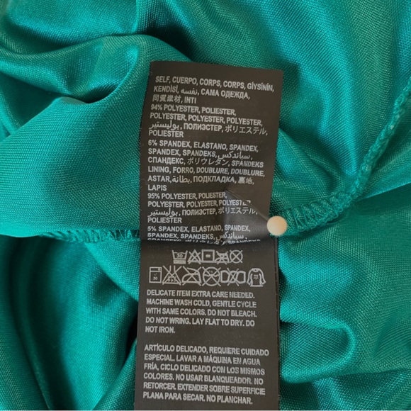 OFF  BEBE TEAL BODYCON RIBBED CUTOUT MINI DRESS - Picture 6 of 15